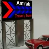 Miller Engineering 8281 HO/O Amtrak Travel by Train Animated Roadside Billboard - Your Source for Gaming Essentials* Trains